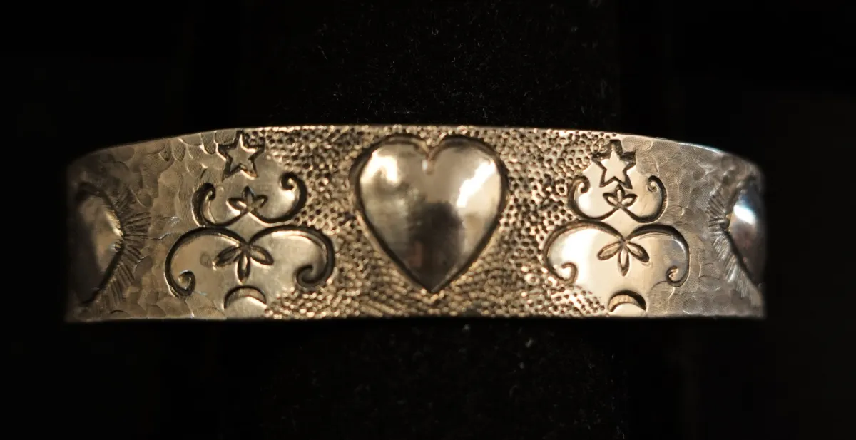 Sterling silver cuff with 3 hearts WOBANAKI design