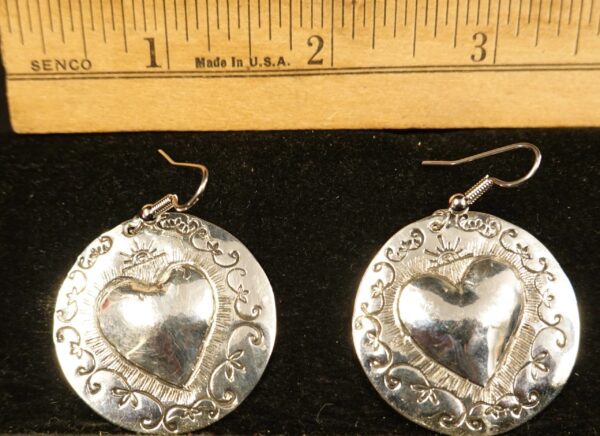 Heart silver repoussé earrings