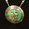 Peruvian pendant with green stone and silver arrowhead by G. Laffi