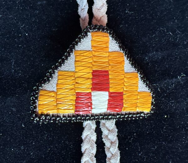 Bolo decorated with porcupine quills