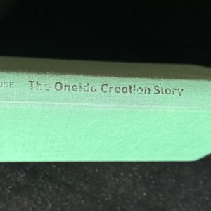 Green book titled "The Oneida Creation Story.